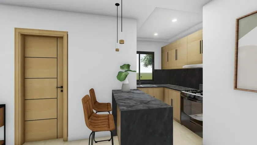 Cocina de Venecia Blue con isla de tope oscuro, banquetas y gabinetes de madera clara