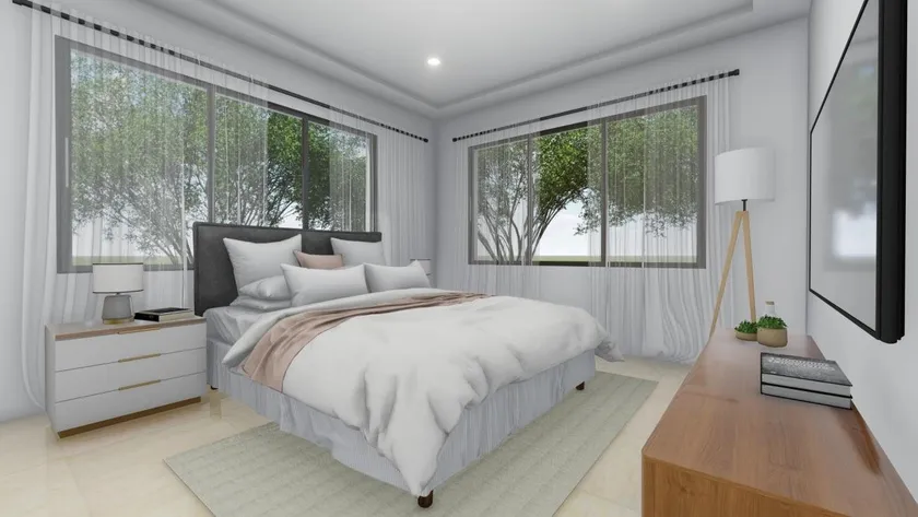 Habitación de Venecia Blue con dos ventanas laterales y escritorio de madera