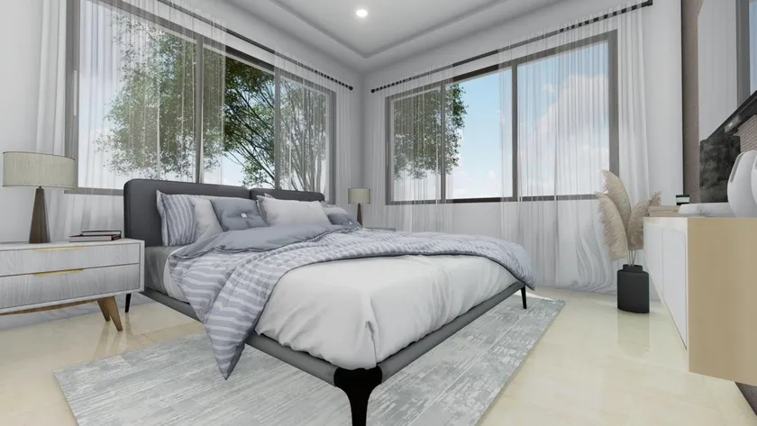 Habitación de Venecia Blue con cama doble, ventanales al jardín y cortinas claras